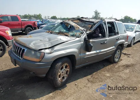 2001 Jeep Grand Cherokee Laredo из США, поврежденный, VIN 1J4GW48S41C551598